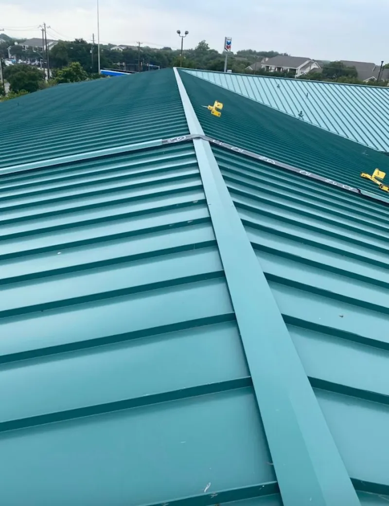 Green commercial metal roof ridge and valley for Metal Roof Repair in Hutchins